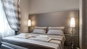 Chambre Double Deluxe, 1 lit double | Matelas Select Comfort, minibar, coffres-forts dans les chambres, bureau