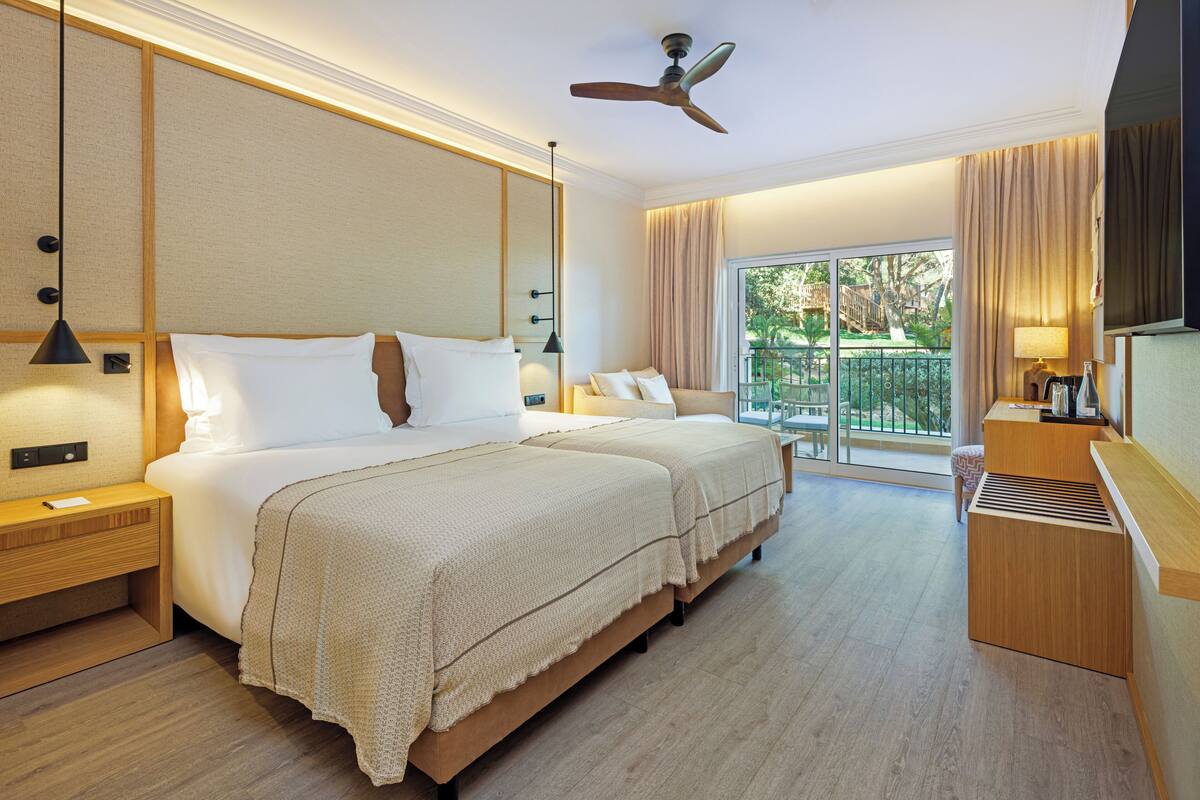 Literie hypoallergénique, coffres-forts dans les chambres, bureau