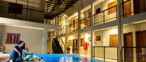 Outdoor pool, open 9:00 AM to 10:00 PM, sun loungers