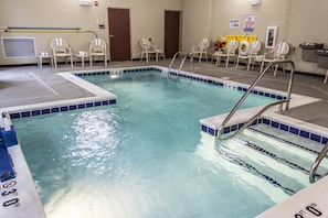 Indoor pool, open 8 AM to 10 PM, pool loungers