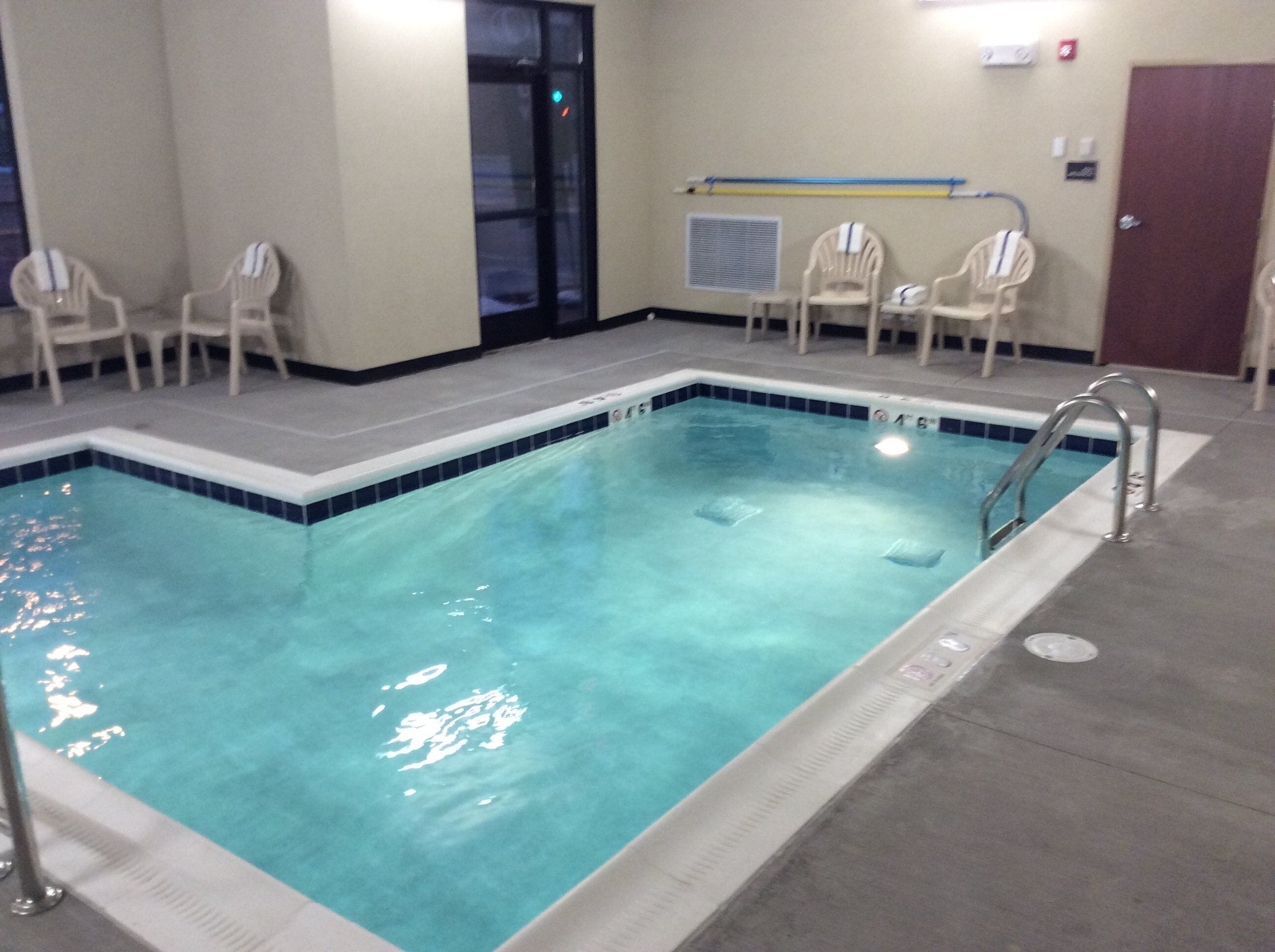indoor pool, open 8 am to 10 pm, pool loungers