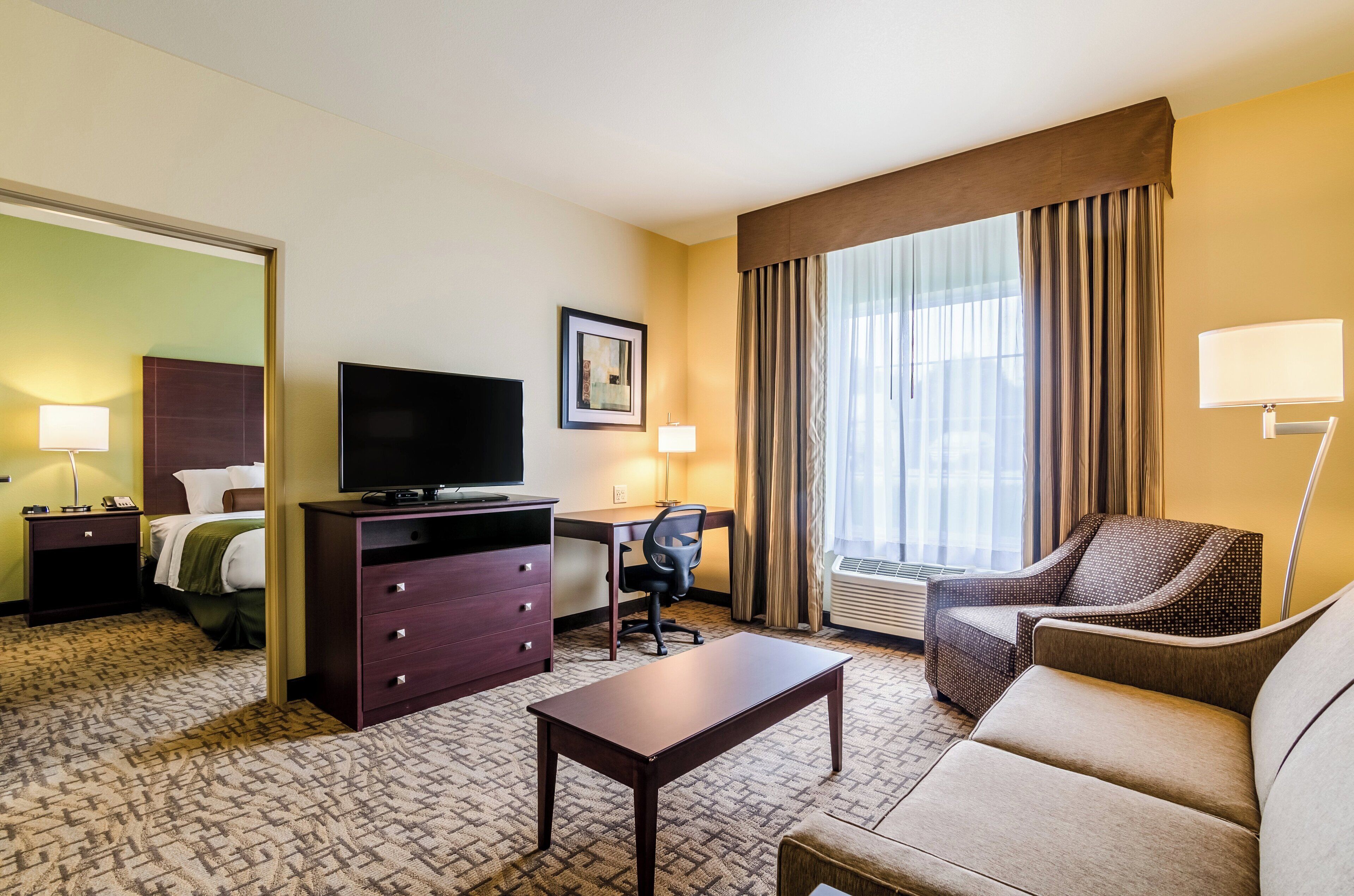 Premium bedding, pillowtop beds, desk, laptop workspace