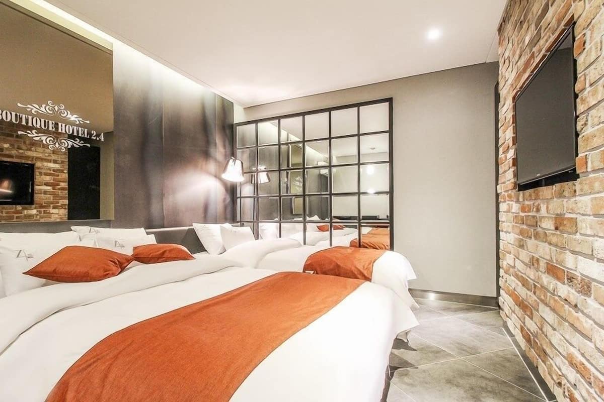 Deluxe Twin kamer | Individueel gedecoreerd, individueel gemeubileerd, een bureau