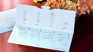 A skincare product package with step-by-step instructions and multiple product types.