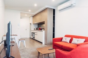Deluxe Two Bedroom Apartment | Living area | LED TV - Comfort Apartments Box Hill (Box Hill)