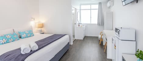 Desk, blackout drapes, iron/ironing board, free WiFi