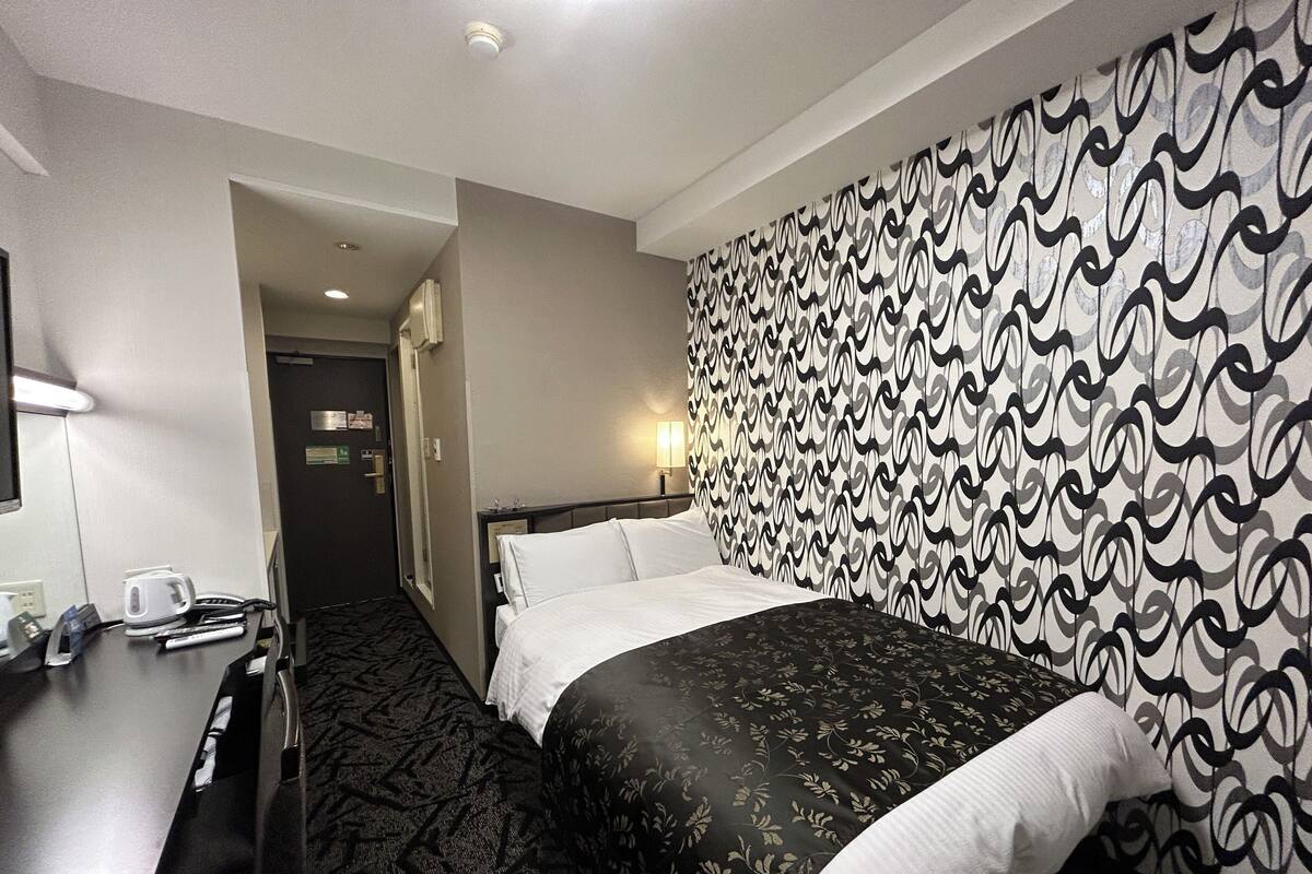 Down comforters, desk, iron/ironing board (on request), WiFi (free)