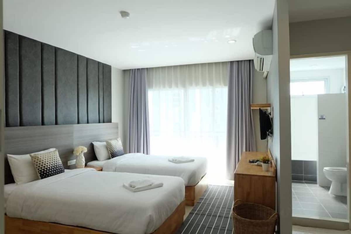 Desk, laptop workspace, free WiFi, bed sheets