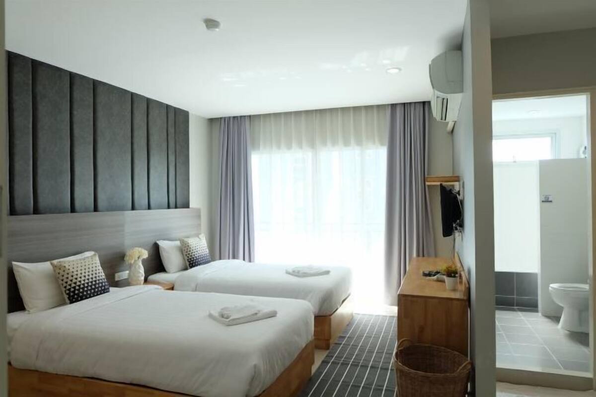 Desk, laptop workspace, free WiFi, bed sheets