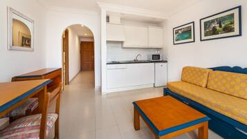 Standard Apartment, 1 Bedroom, Beach View | Private kitchen | Fridge, microwave, oven, stovetop