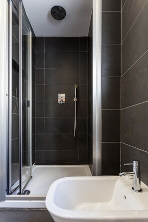 Shower, free toiletries, hair dryer, towels