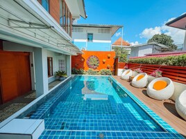 Outdoor pool, pool umbrellas, sun loungers