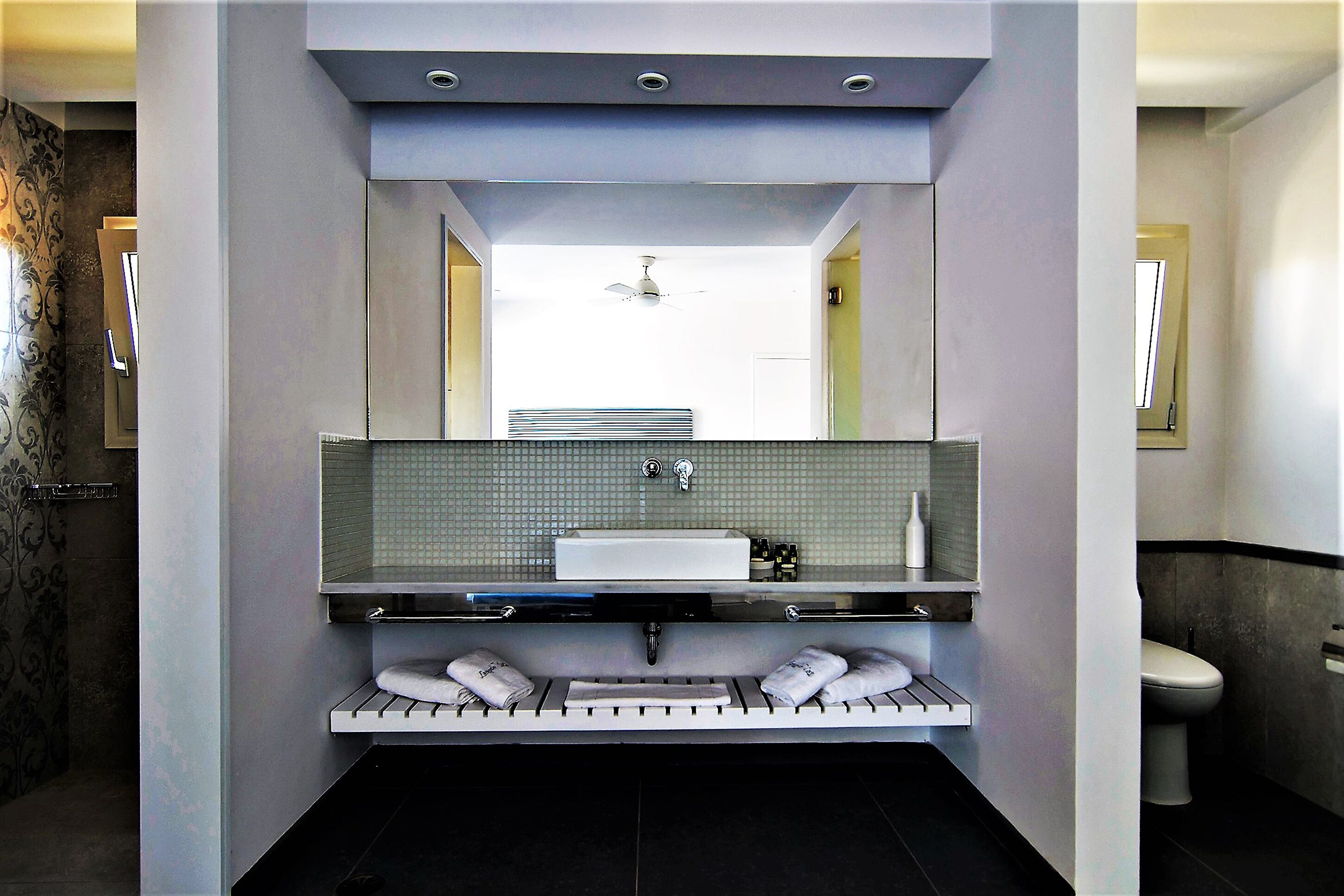 luxury studio suite, 2 bedrooms | bathroom | shower, designer toiletries, hair dryer, towels