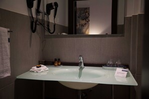 Shower, free toiletries, hair dryer, slippers