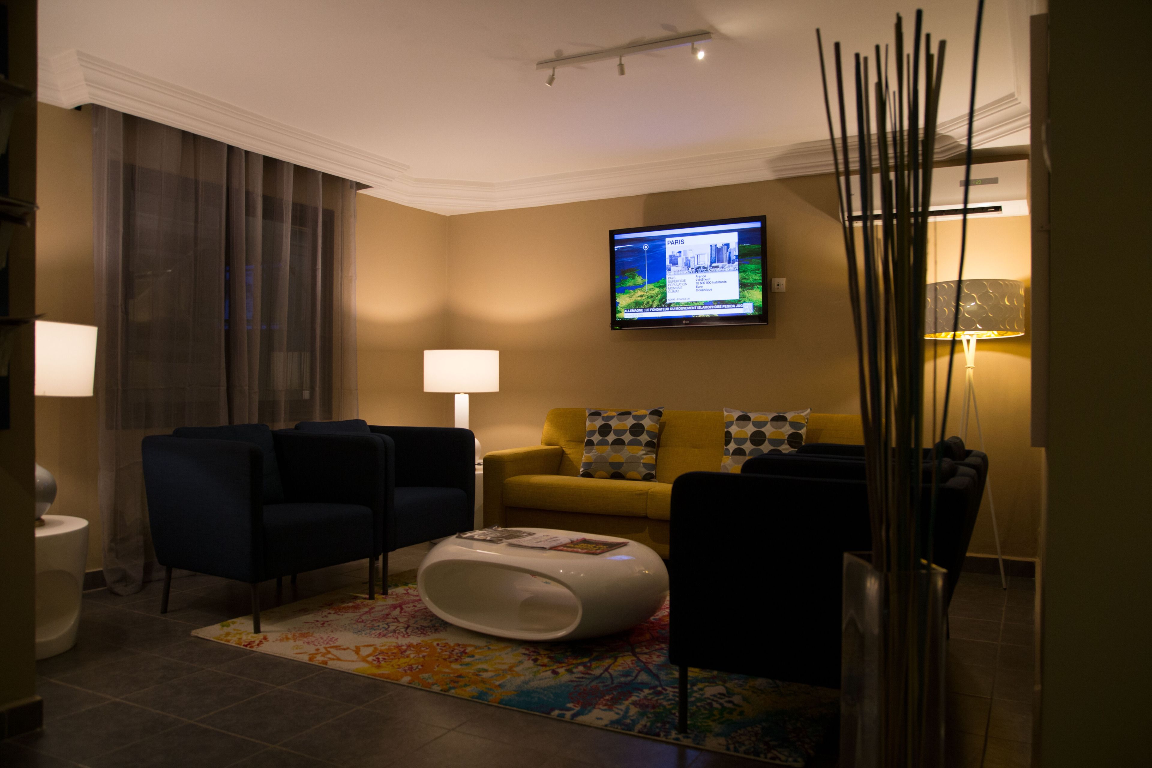 superior suite | living area | 32-inch flat-screen tv with satellite channels, tv