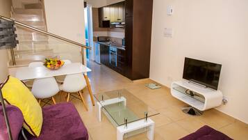 Panoramic Apartment, 1 Bedroom, Terrace, Sea View | Living area | Flat-screen TV