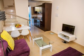 Panoramic Apartment, 1 Bedroom, Terrace, Sea View | Living area | Flat-screen TV
