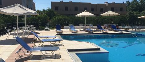 Outdoor pool, pool umbrellas, pool loungers