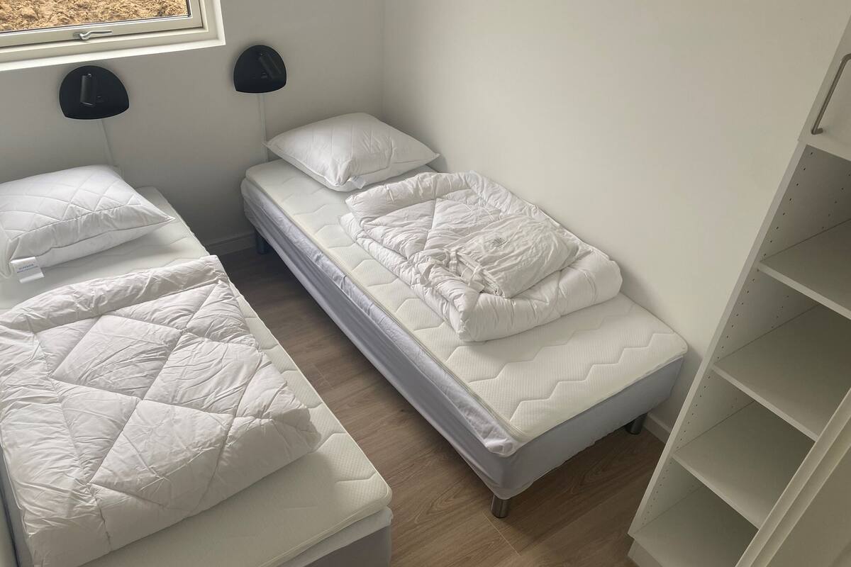 Blackout curtains, soundproofing, free WiFi, bed sheets