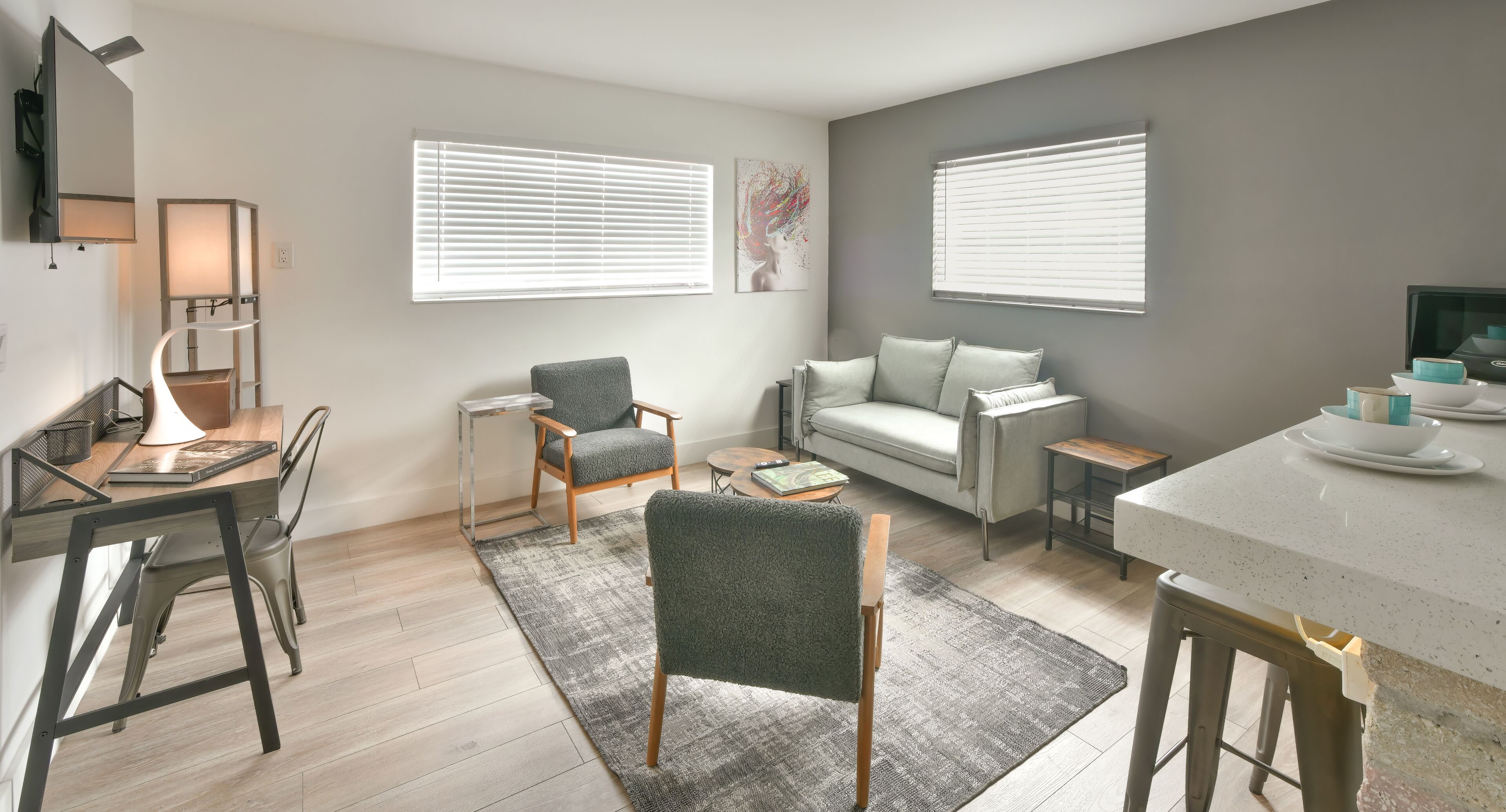 Chic Designer One Bedroom and One Queen Bed Full Kitchen | Living area | 42-inch flat-screen TV with cable channels, TV, iPod dock