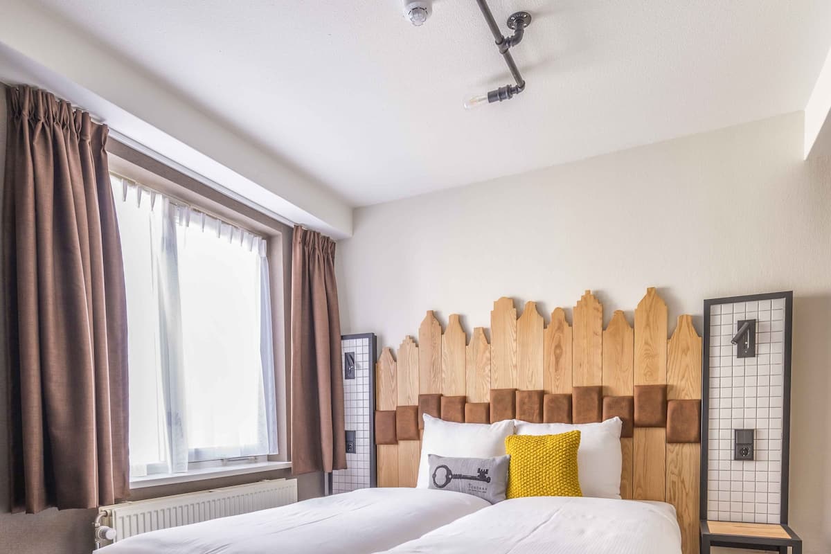 Standaard Twin kamer | Een kluis op de kamer, verduisterende gordijnen, gratis wifi, beddengoed