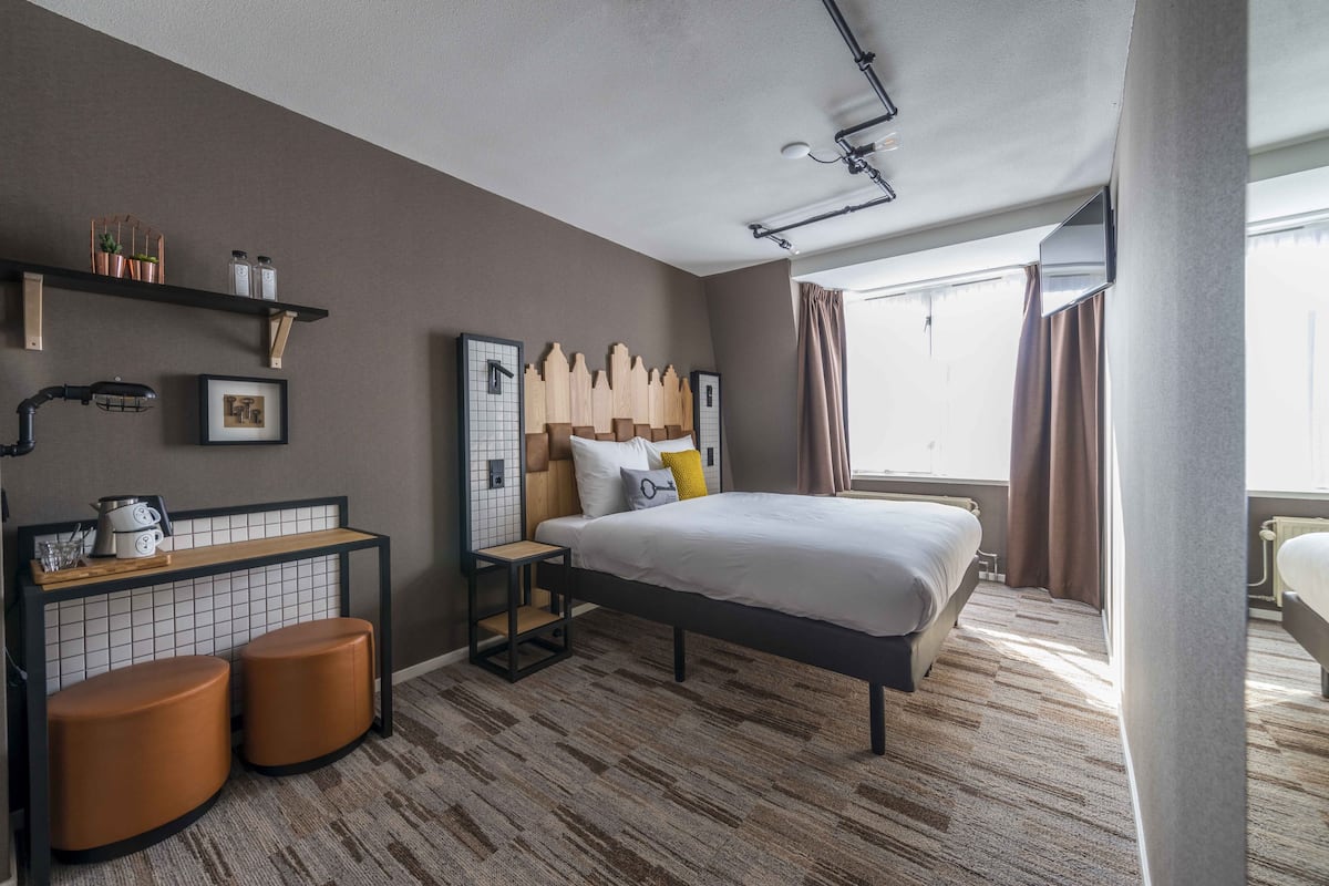 Een kluis op de kamer, verduisterende gordijnen, gratis wifi, beddengoed