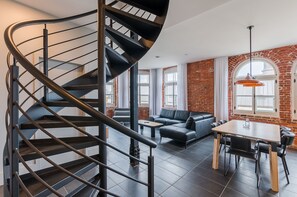 Penthouse, 2 Bedrooms (St-Laurent), Panoramic Views (T401) | Living room | 45-inch flat-screen TV with cable channels, TV - Les Lofts du Trésor - By Les Lofts Vieux-Quebec (Québec City)