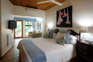 Deluxe Triple Room, Multiple Beds (Room B) | In-room safe, individually decorated, individually furnished, bed sheets