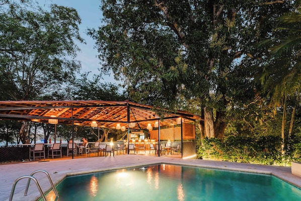 Outdoor pool, open 8:00 AM to 8:00 PM, sun loungers