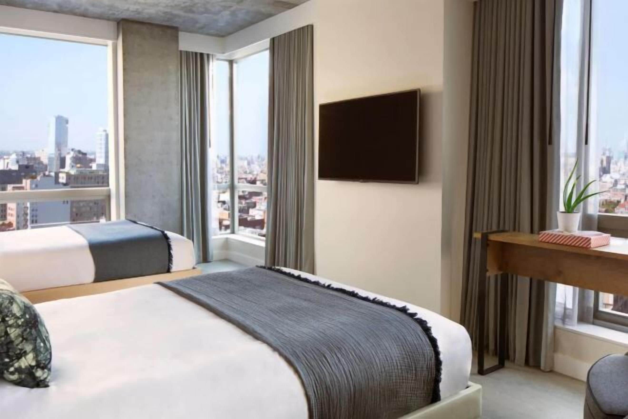 Premium bedding, pillowtop beds, in-room safe, individually decorated