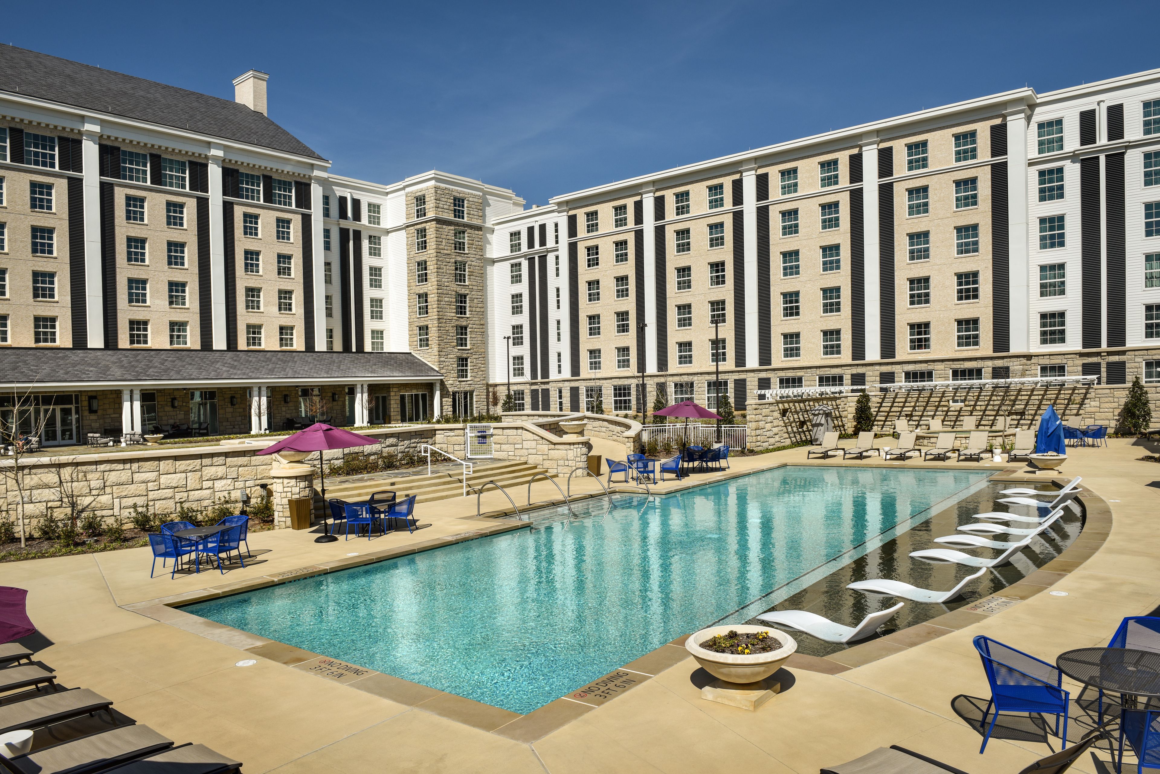 Seasonal outdoor pool, pool umbrellas, pool loungers