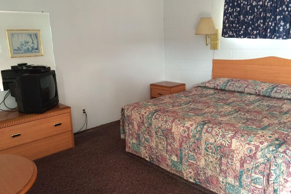Quarto, 1 cama King | Wi-Fi de cortesia