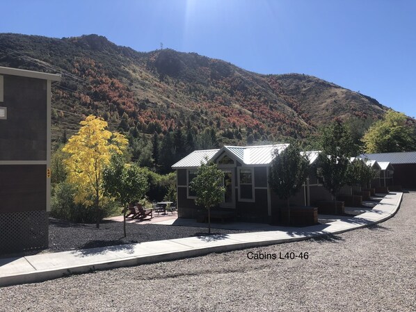A row of cabins with a mountain backdrop, labeled L40-46. - Lava Hot Springs East KOA Holiday (Lava Hot Springs)