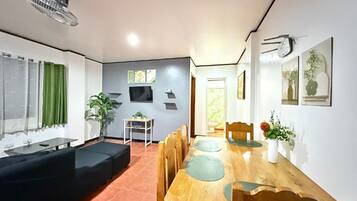 Comfort Condo, 1 Bedroom, Kitchen | Living area | 32-inch flat-screen TV with cable channels, LED TV