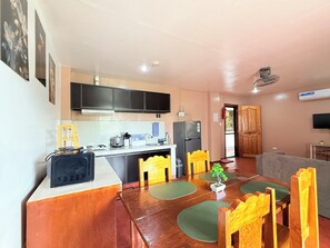 Family Condo, 2 Bedrooms, Kitchen | Private kitchen | Full-size fridge, stovetop, electric kettle, rice cooker