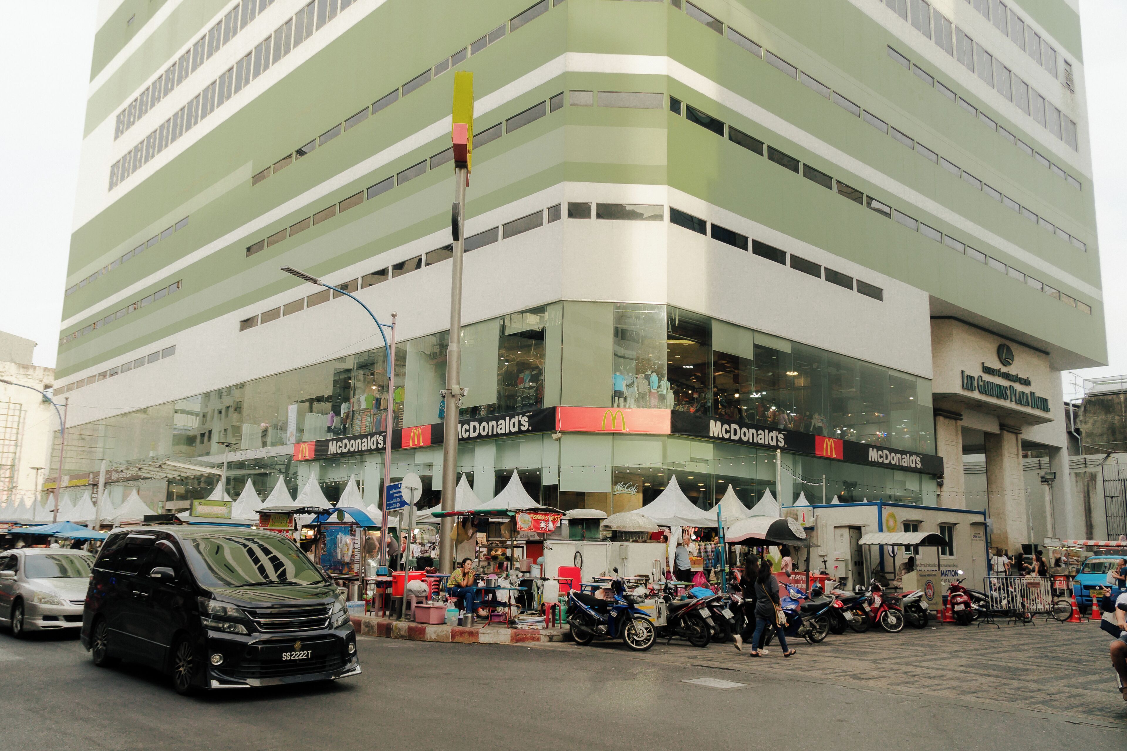 A multi-story building with a McDonald's restaurant on the ground floor.