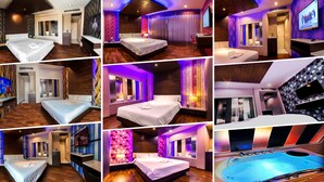 A hotel room with a bed, a TV, a desk, and a bathroom with a bathtub. - The Ring Hotel (Hat Yai)