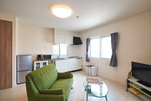 Standard Twin Room, Non Smoking | Living room | Flat-screen TV, DVD player - Rainbow Terrace (Ginowan)