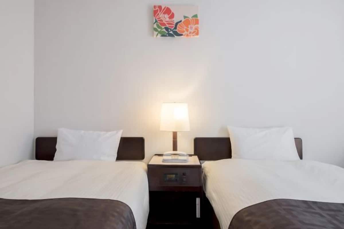 Couette en duvet d'oie, coffres-forts dans les chambres, bureau