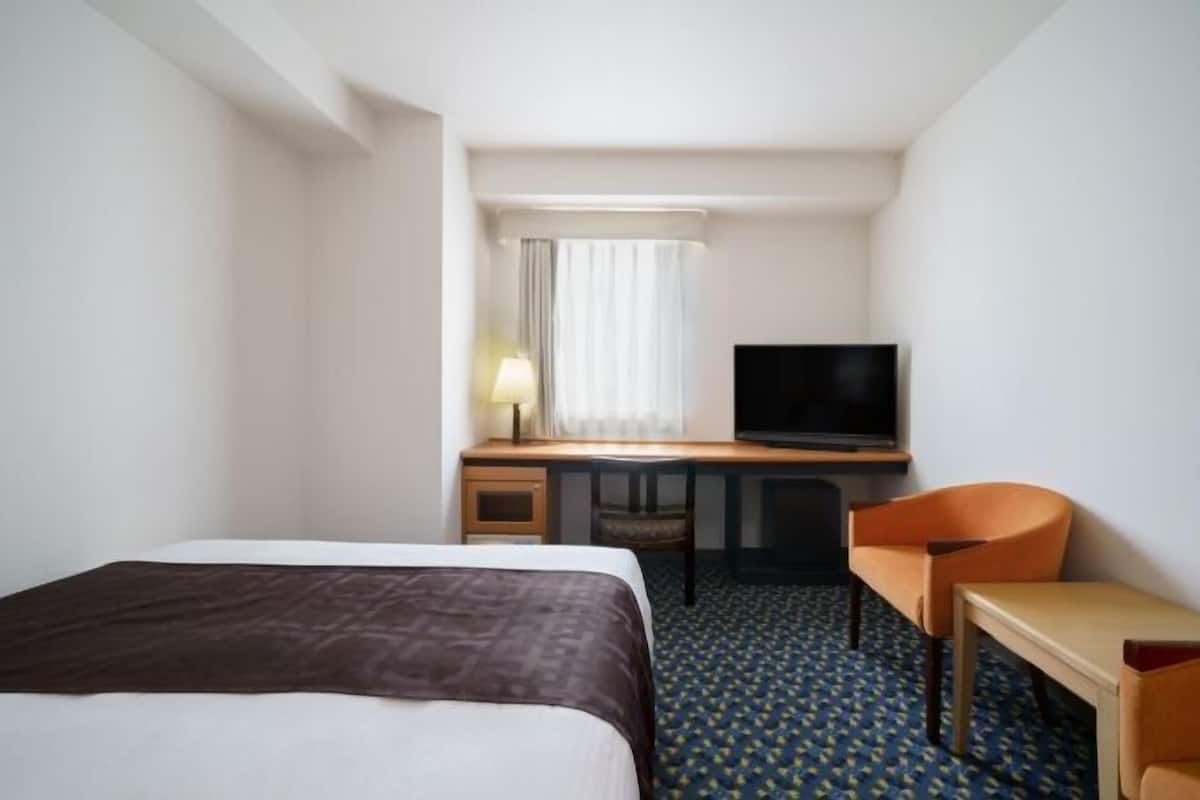 Couette en duvet d'oie, coffres-forts dans les chambres, bureau