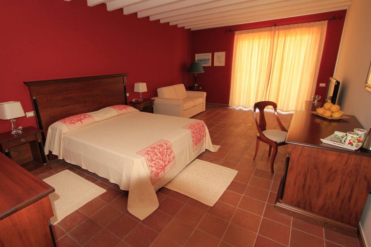 Suite, 1 King Bed with Sofa bed, Sea View | 1 bedroom, premium bedding, minibar, in-room safe