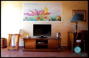 Suite, 1 King Bed with Sofa bed, Sea View | Bathroom | Separate bathtub and shower, free toiletries, towels