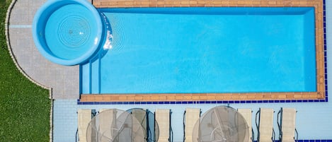 Outdoor pool, pool umbrellas, sun loungers