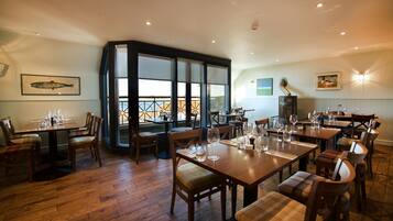 Breakfast, lunch, dinner served; local cuisine