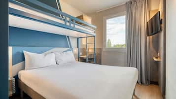 Premium bedding, desk, laptop workspace, blackout curtains