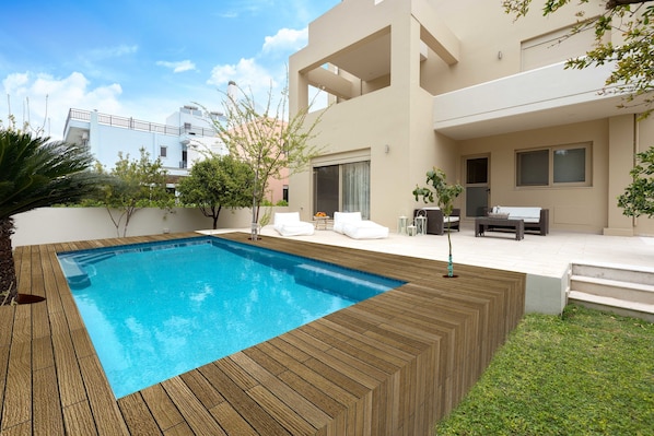 Seasonal outdoor pool, pool umbrellas, sun loungers