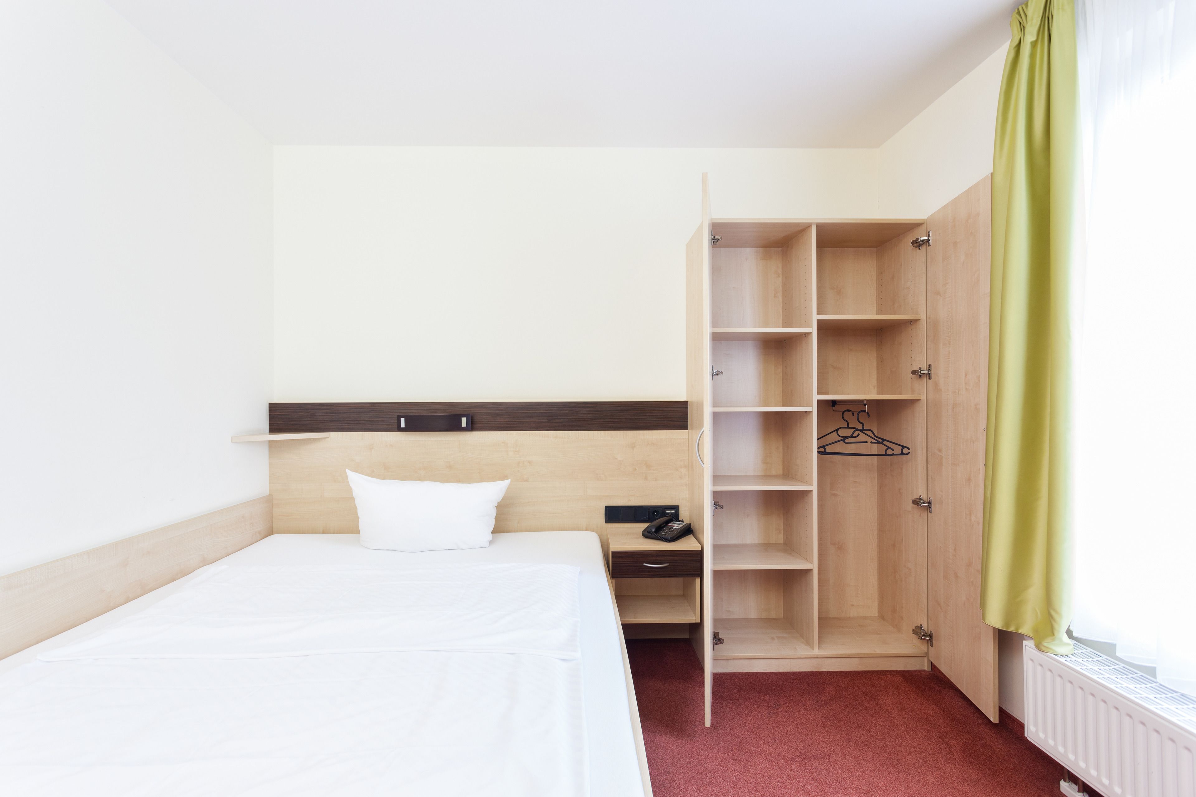 desk, blackout curtains, free wired internet, bed sheets