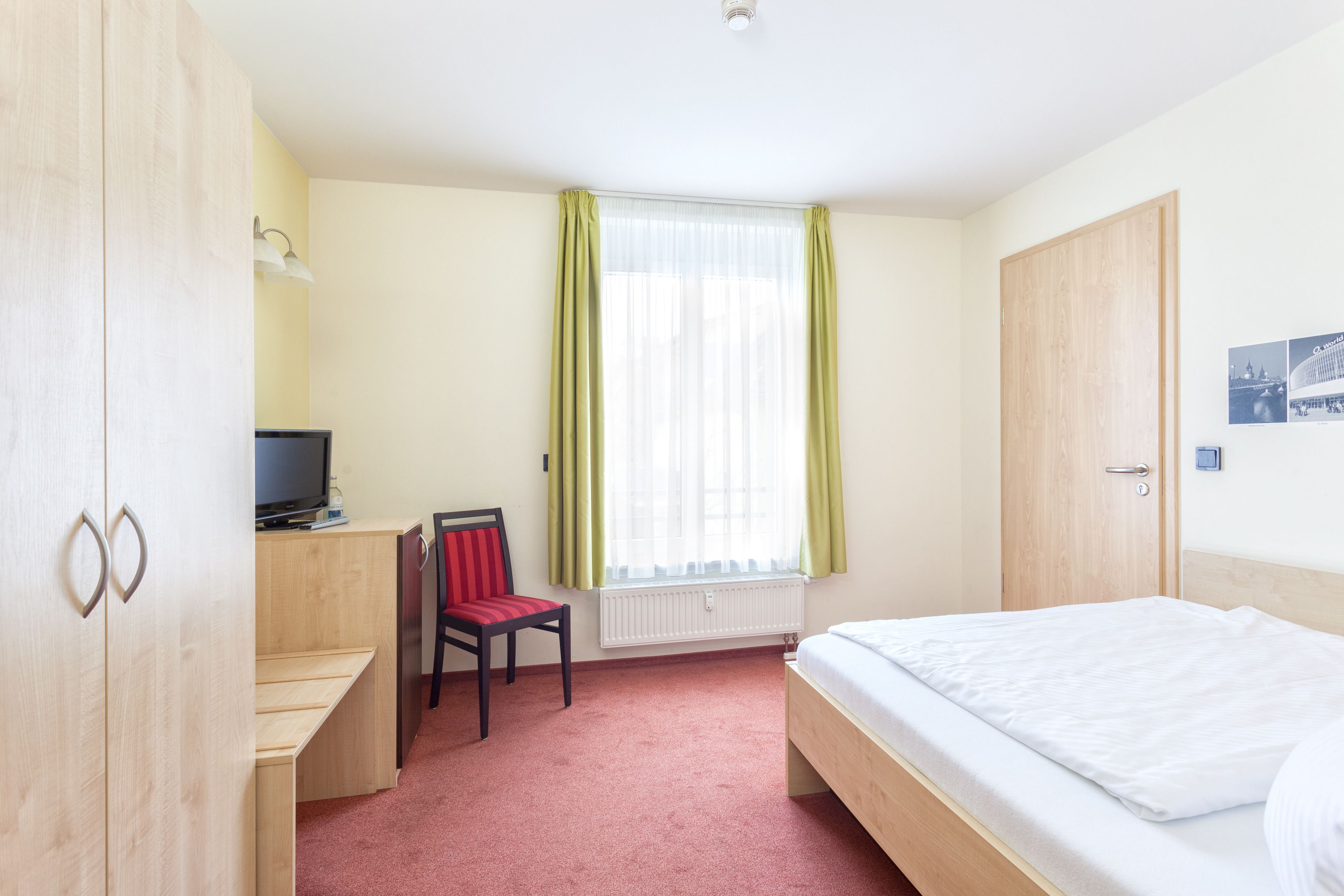 Desk, blackout drapes, free wired internet, bed sheets