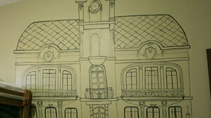 A line drawing of a building with a central tower, multiple windows, and a dome. - Curitiba Casa Hostel (Curitiba)