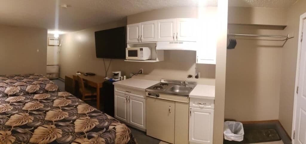 Deluxe Room, 2 Queen Beds | Desk, iron/ironing board, free WiFi, bed sheets